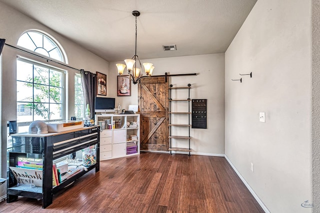 6411 Hall Of Fame, Midland, TX 79706 - office space with a barn door, wood finished floors, a chandelier, and baseboards