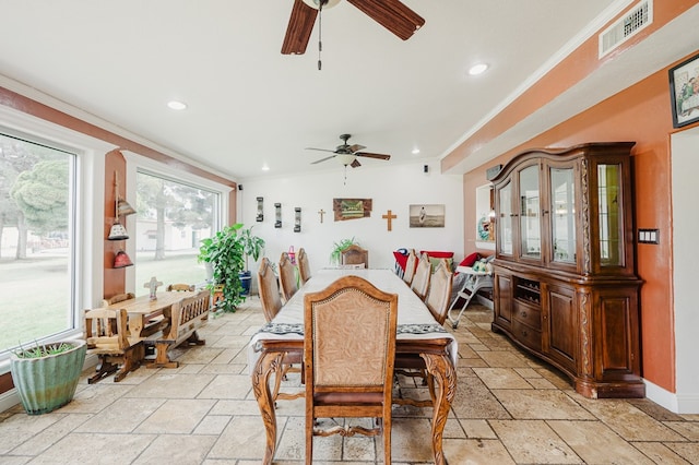 3708 N Moss Ave, Odessa, TX 79764 - dining room with ceiling fan, stone tile flooring, ornamental molding, recessed lighting, and baseboards