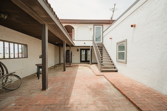 3708 N Moss Ave, Odessa, TX 79764 - doorway to property with stucco siding