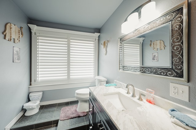 3708 N Moss Ave, Odessa, TX 79764 - bathroom featuring baseboards, toilet, vanity, and tile patterned flooring