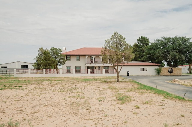 3708 N Moss Ave, Odessa, TX 79764 - view of front of house with fence and stucco siding