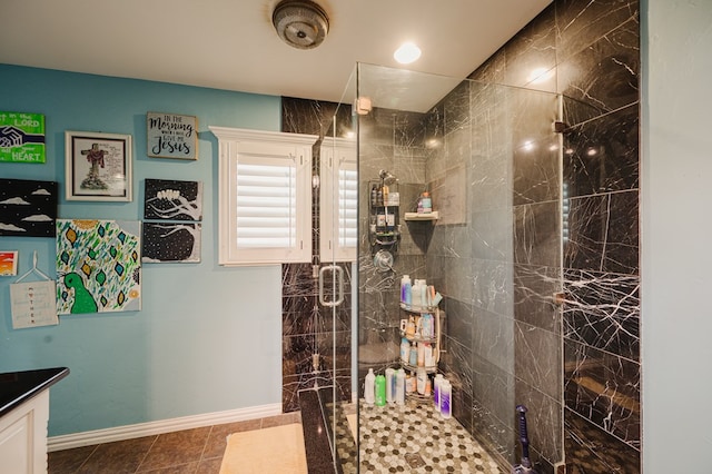 3708 N Moss Ave, Odessa, TX 79764 - full bathroom featuring a stall shower, vanity, and baseboards