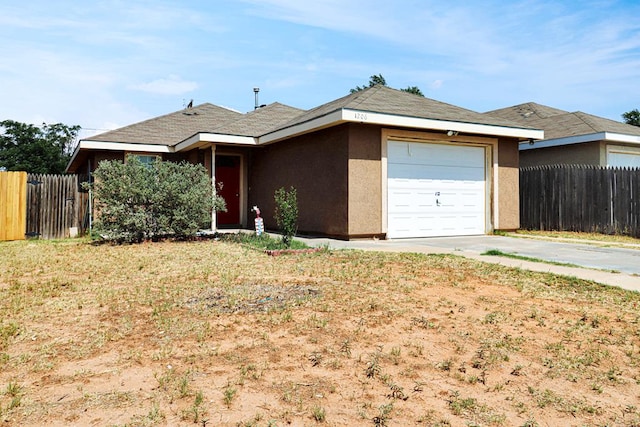 1206 Alameda Ave, Odessa, TX 79763 - ranch-style house featuring a garage, stucco siding, and driveway