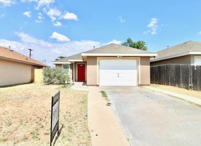 1206 Alameda Ave, Odessa, TX 79763 - ranch-style house with concrete driveway and stucco siding