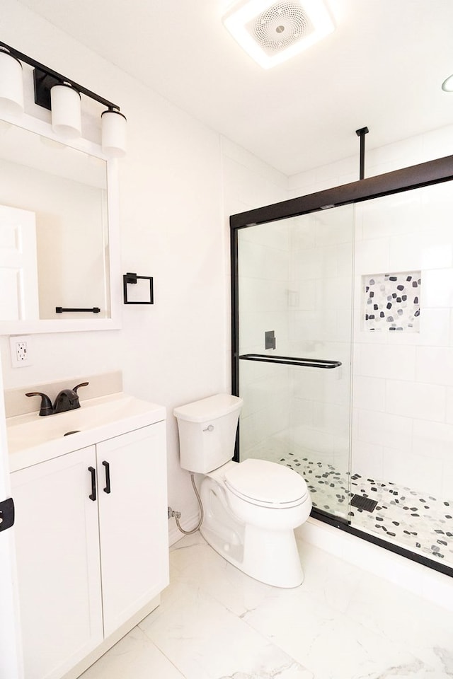 708 S Eric Ave, Monahans, TX 79756 - full bathroom featuring marble finish floors, vanity, and a stall shower