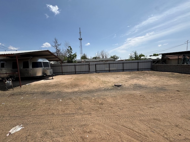 1044 Washington St, Kermit, TX 79745 - view of yard with a carport