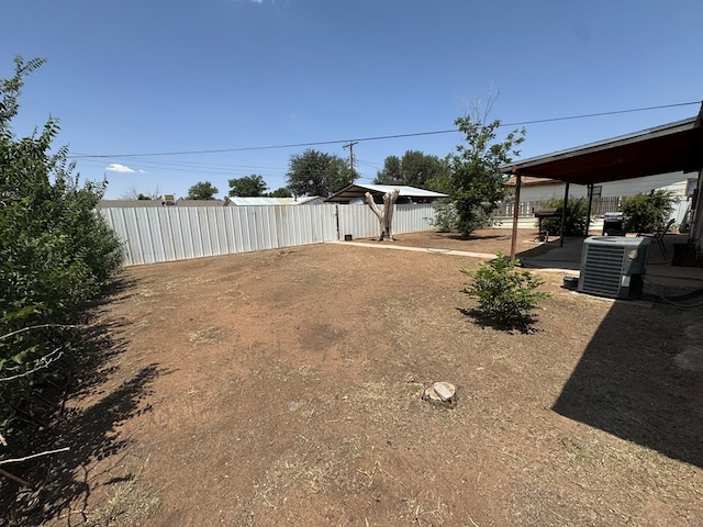 1044 Washington St, Kermit, TX 79745 - view of yard with central air condition unit