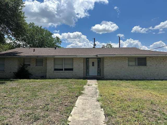 302 E Byrd St, Universal City, TX 78148 - ranch-style house featuring a front lawn and stone siding