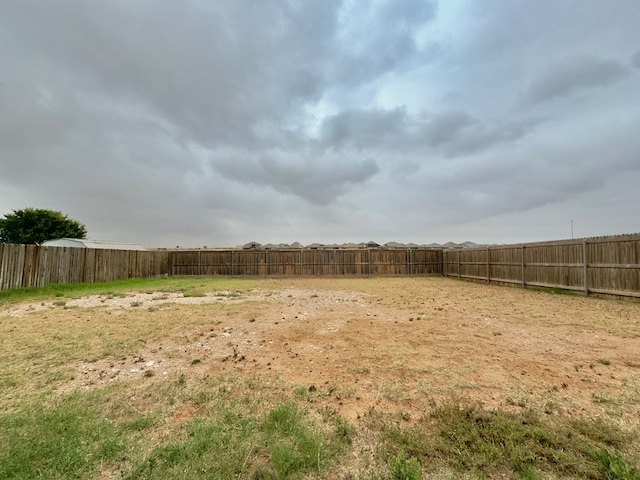 view of yard featuring a fenced backyard