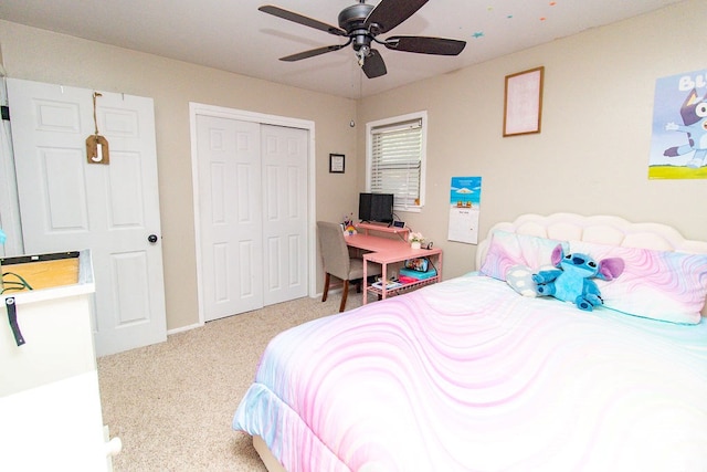 bedroom with a closet, ceiling fan, and carpet flooring