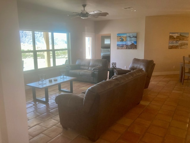 420 Santana Dr, Lajitas, TX 79852 - living room featuring a ceiling fan and light tile patterned floors