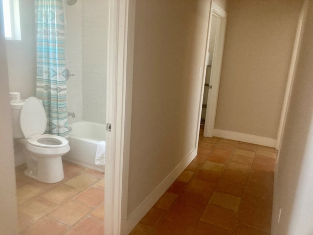 420 Santana Dr, Lajitas, TX 79852 - bathroom with toilet and shower / tub combo with curtain
