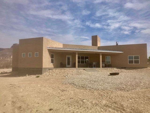 420 Santana Dr, Lajitas, TX 79852 - back of property featuring a chimney