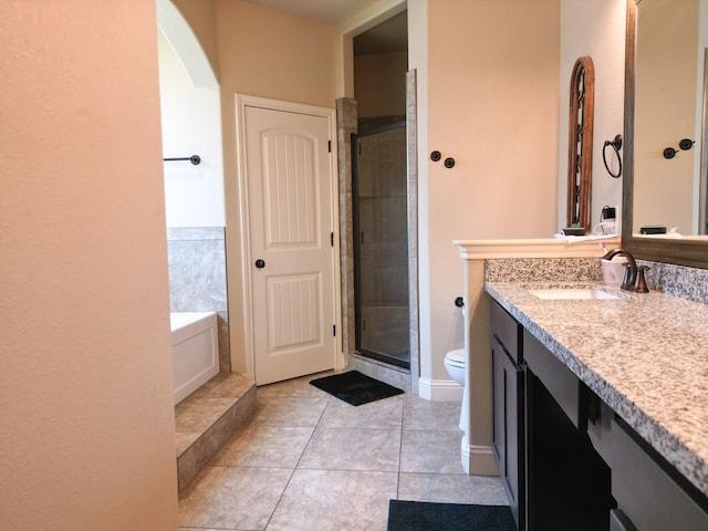 32 Balmoral Cir, Odessa, TX 79765 - full bath with vanity, a stall shower, a bath, and tile patterned floors
