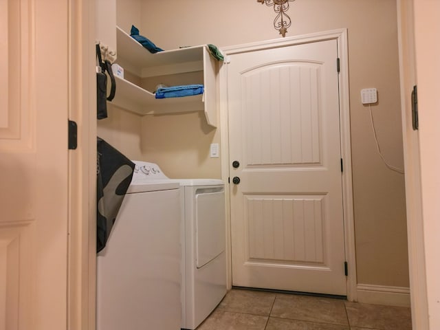 32 Balmoral Cir, Odessa, TX 79765 - laundry room with washing machine and clothes dryer and light tile patterned floors