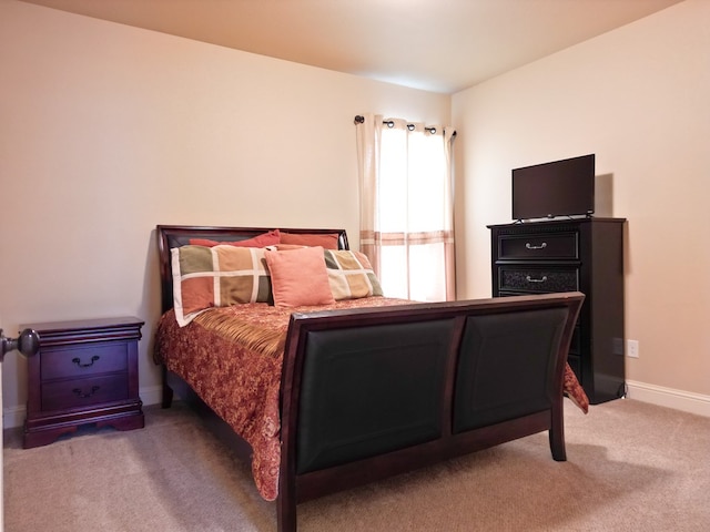32 Balmoral Cir, Odessa, TX 79765 - bedroom featuring carpet floors and baseboards