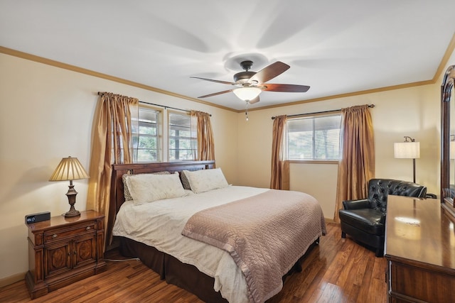 203 NE 8th St, Marathon, TX 79842 - bedroom featuring multiple windows, crown molding, wood finished floors, and ceiling fan