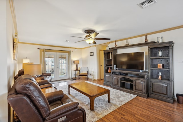 203 NE 8th St, Marathon, TX 79842 - living room with ornamental molding, ceiling fan, and wood finished floors