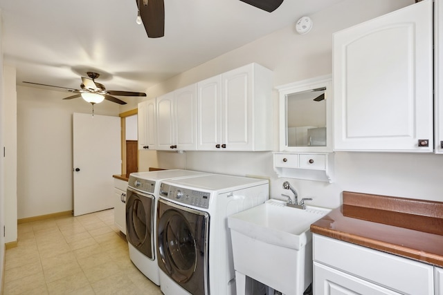 203 NE 8th St, Marathon, TX 79842 - laundry area featuring a ceiling fan, washer and dryer, cabinet space, and baseboards