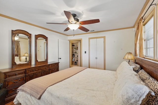 203 NE 8th St, Marathon, TX 79842 - bedroom featuring a closet, ornamental molding, and a ceiling fan