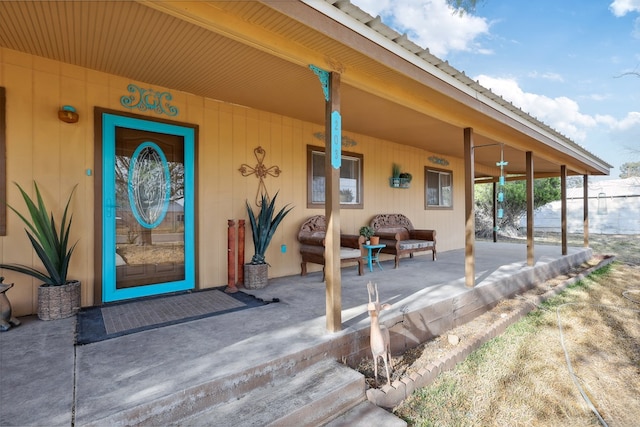 203 NE 8th St, Marathon, TX 79842 - property entrance featuring a porch and outdoor lounge area