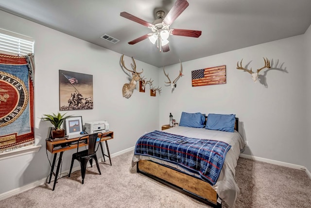 8430 E County Rd 114, Midland, TX 79706 - carpeted bedroom featuring baseboards and ceiling fan
