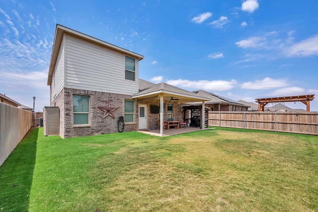 8430 E County Rd 114, Midland, TX 79706 - rear view of property featuring a ceiling fan, a patio, and brick siding