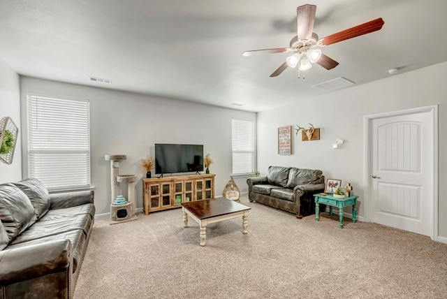 8430 E County Rd 114, Midland, TX 79706 - living room featuring carpet floors, a ceiling fan, and baseboards