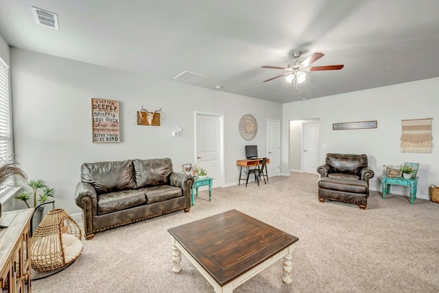 8430 E County Rd 114, Midland, TX 79706 - living area featuring carpet, ceiling fan, a desk, and baseboards