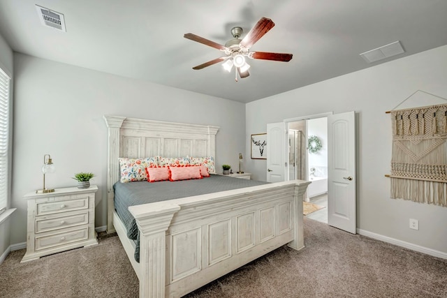 8430 E County Rd 114, Midland, TX 79706 - carpeted bedroom with baseboards and ceiling fan