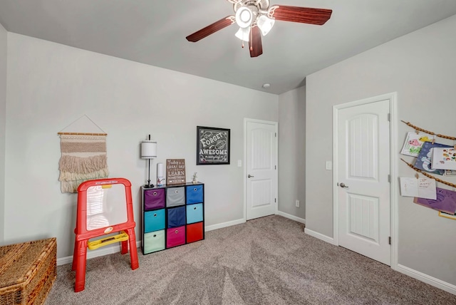 8430 E County Rd 114, Midland, TX 79706 - rec room with carpet floors, a ceiling fan, and baseboards