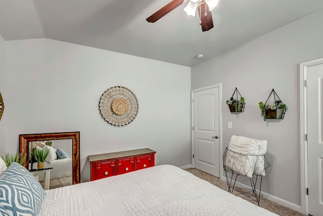 8430 E County Rd 114, Midland, TX 79706 - carpeted bedroom featuring baseboards, vaulted ceiling, and ceiling fan