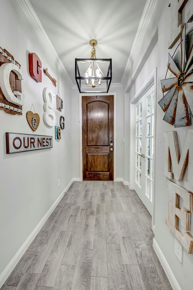 8430 E County Rd 114, Midland, TX 79706 - corridor featuring french doors, a chandelier, wood finished floors, ornamental molding, and baseboards