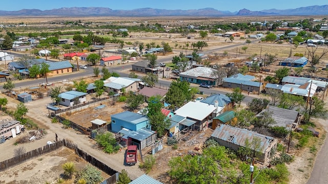106 SE 4th St, Marathon, TX 79842 - aerial perspective of suburban area with a mountainous background and a desert landscape