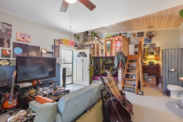 106 SE 4th St, Marathon, TX 79842 - living room with ornamental molding, a ceiling fan, and carpet flooring
