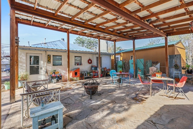 106 SE 4th St, Marathon, TX 79842 - view of patio / terrace featuring an outdoor fire pit and outdoor dining area