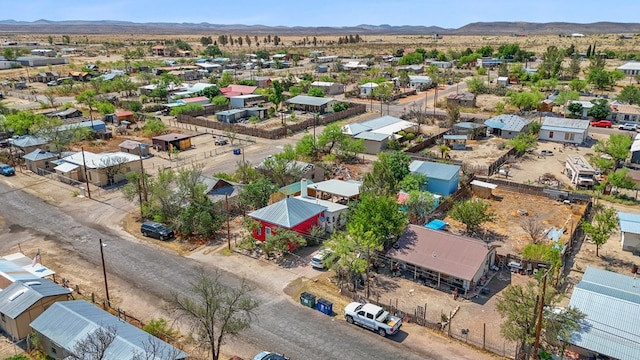 106 SE 4th St, Marathon, TX 79842 - aerial perspective of suburban area featuring a mountainous background