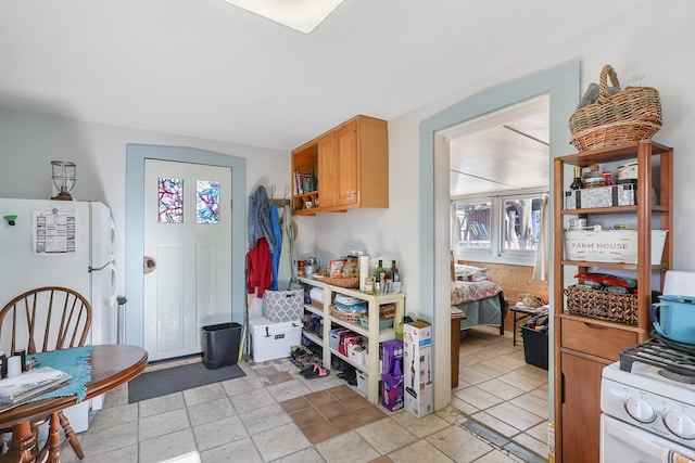 106 SE 4th St, Marathon, TX 79842 - kitchen featuring freestanding refrigerator and open shelves