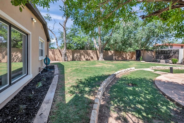1600 W Kansas Ave, Midland, TX 79701 - fenced backyard with a patio