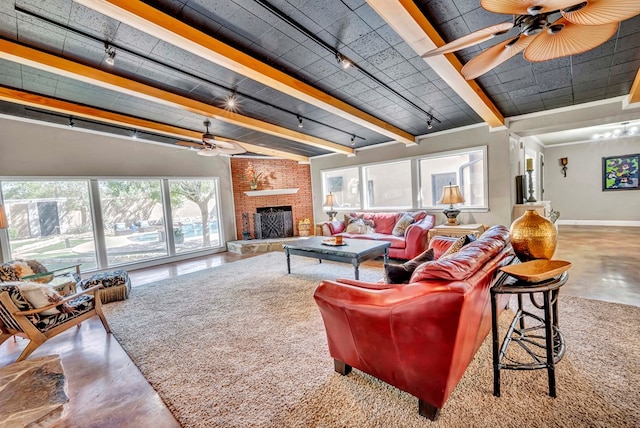 1600 W Kansas Ave, Midland, TX 79701 - living area featuring a ceiling fan, rail lighting, and concrete flooring