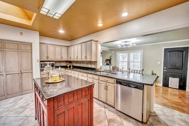 1600 W Kansas Ave, Midland, TX 79701 - kitchen with stainless steel appliances, tasteful backsplash, light tile patterned floors, recessed lighting, and crown molding