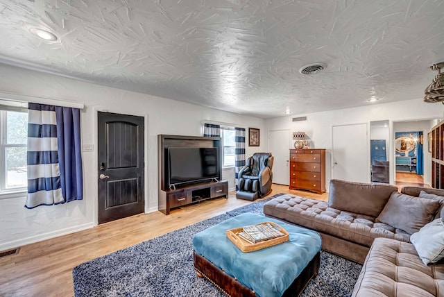 1600 W Kansas Ave, Midland, TX 79701 - living room with baseboards and wood finished floors