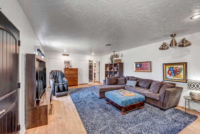 1600 W Kansas Ave, Midland, TX 79701 - living room with light wood-type flooring