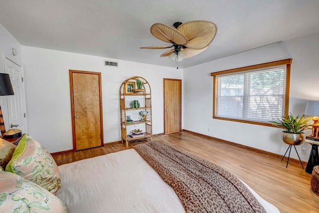 1600 W Kansas Ave, Midland, TX 79701 - bedroom featuring wood finished floors and a ceiling fan