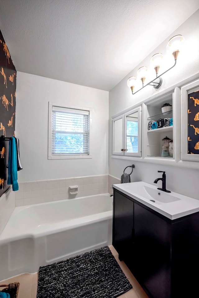 1600 W Kansas Ave, Midland, TX 79701 - bathroom with vanity and a bath