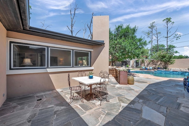 1600 W Kansas Ave, Midland, TX 79701 - fenced backyard featuring a patio and outdoor dining space