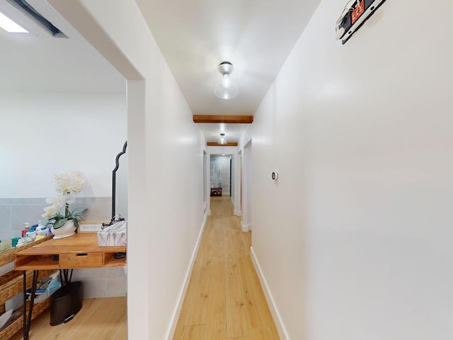 1411 NE Mustang Dr, Andrews, TX 79714 - hallway featuring light wood finished floors