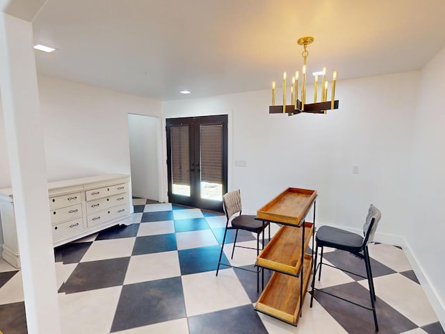 1411 NE Mustang Dr, Andrews, TX 79714 - dining area with french doors, tile patterned floors, and a chandelier