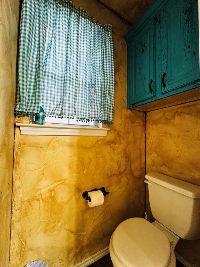 8801 N Rice Ave, Odessa, TX 79765 - bathroom featuring toilet