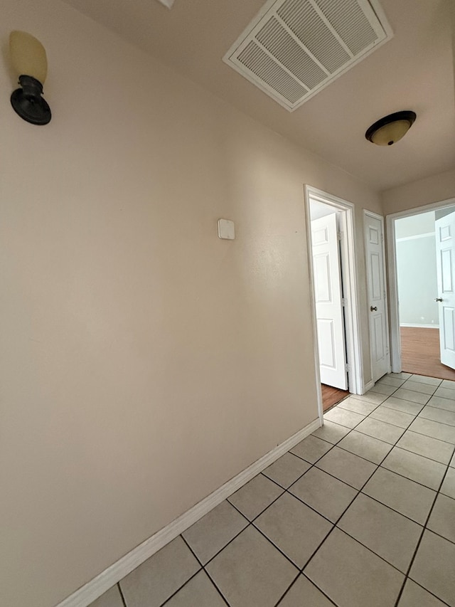 615 Placer Ave, Odessa, TX 79763 - spare room with light tile patterned flooring and baseboards